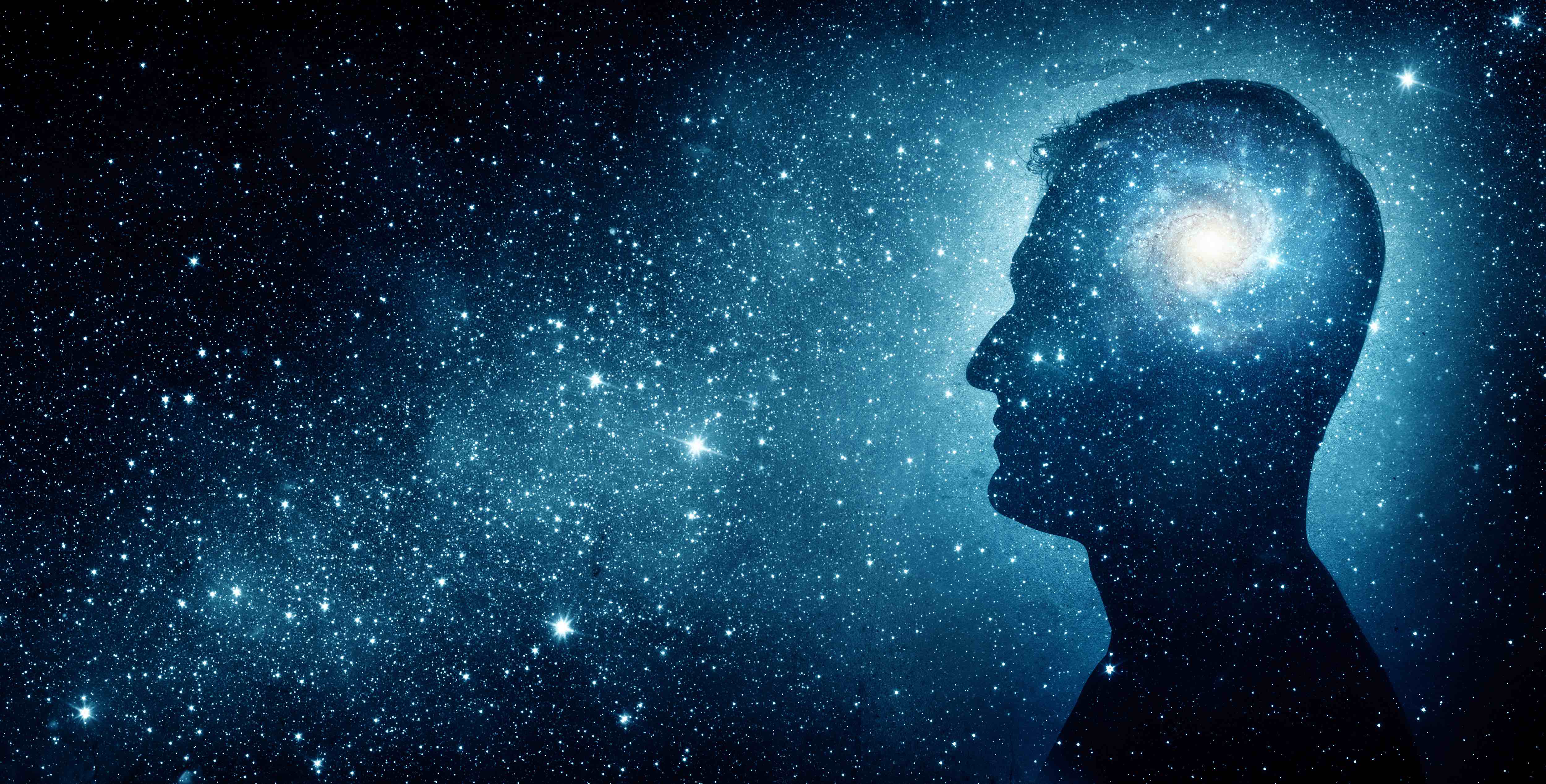 The universe within. Silhouette of a man inside the universe. The concept on scientific and philosophical topics.